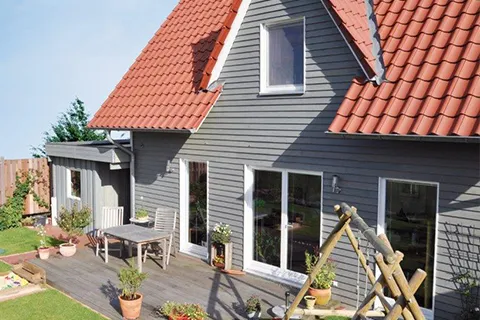 /assets/fassade-holz-Yd3IA6EX.webp